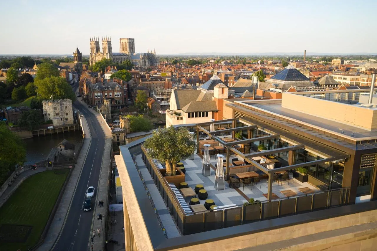 an overhead view of a city with a building at Malmaison York in York