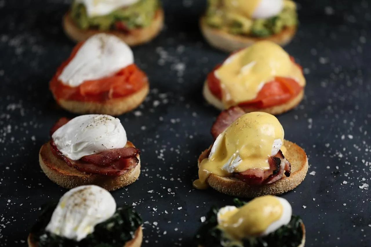 a group of mini sandwiches with ice cream and tomatoes at Malmaison York in York